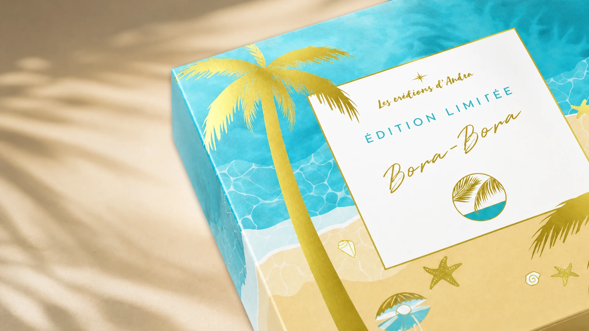 Bora-Bora packaging box showing printed palm artwork and a warm yellow side panel.