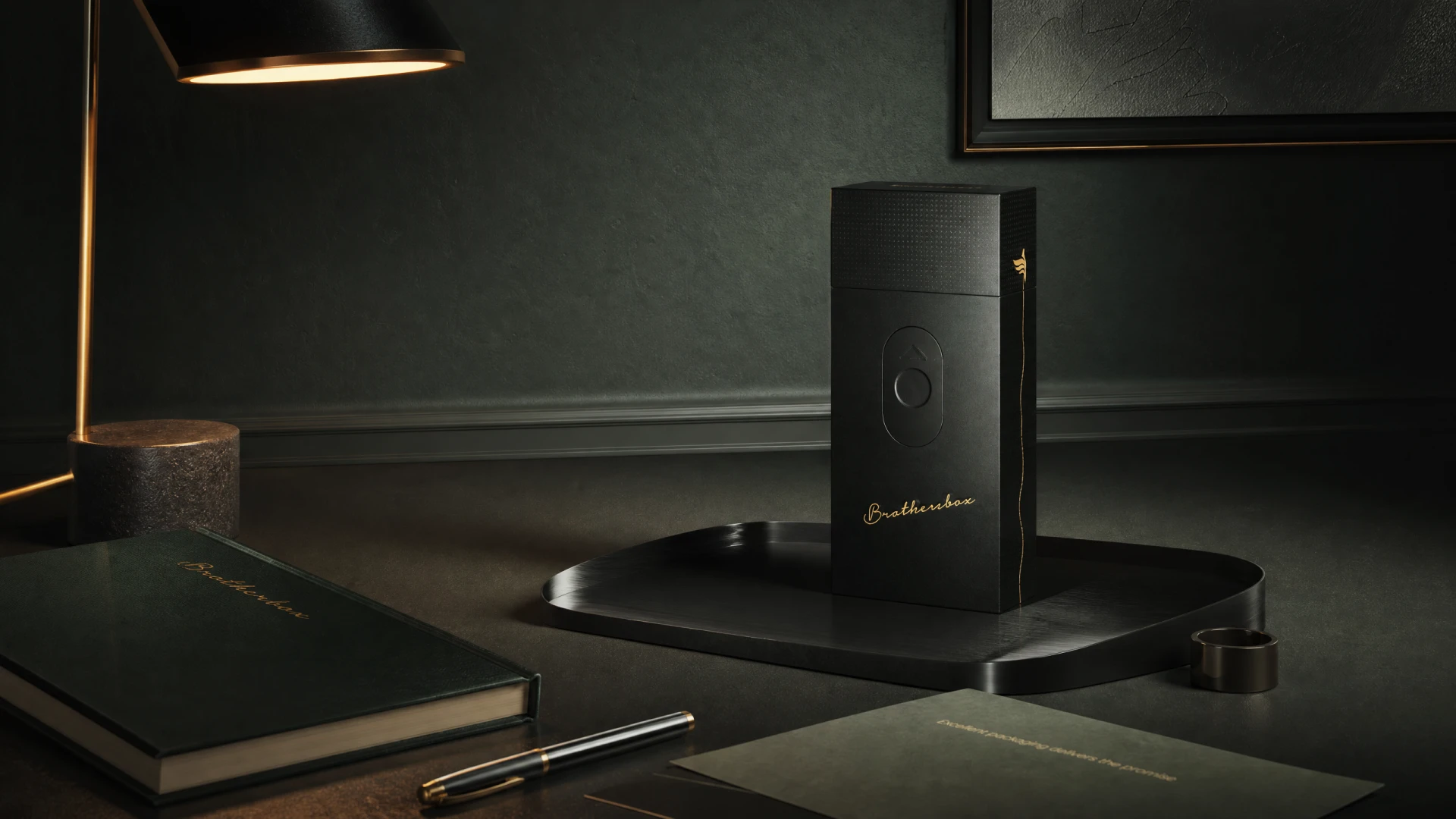 Finished Brothersbox packaging placed on luxury desktop scene with desk lamp, notebook and stationery, dim warm ambient lighting